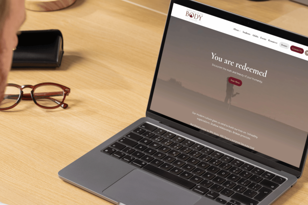 TOB CLE website homepage on laptop